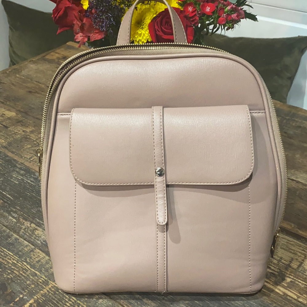 Gently used Miztique vegan leather women’s backpack.